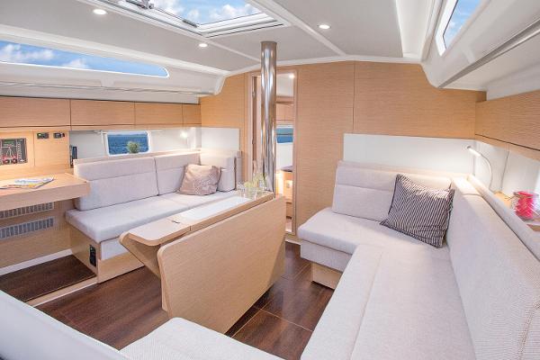 Slide: The Image of Luxurious interior of 2025 Hanse 418 yacht with modern seating and natural light. - 11