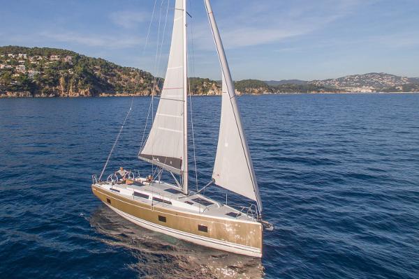Slide: The Image of Sailing yacht Hanse 418, 2025 model, cruising on a sunny day. - 21