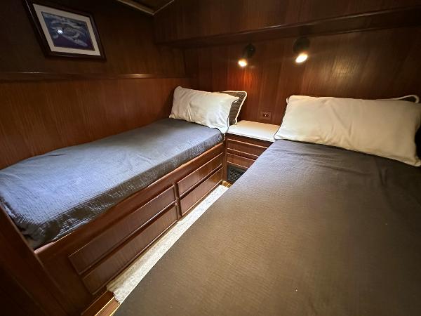 Slide: The Image of Cozy twin cabin in 1986 Hatteras 52 Convertible yacht. - 47