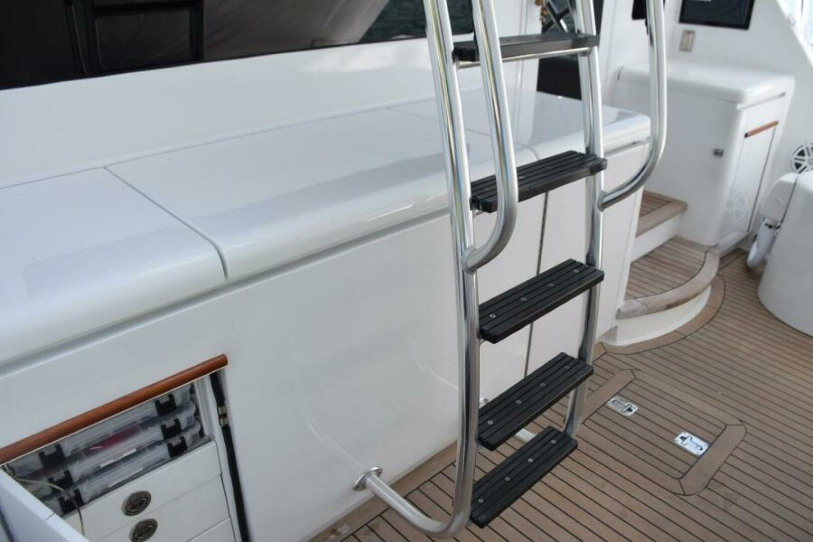 Slide: The Image of Tackle Drawers in Console and Ladder to Flybridge    - 5133544