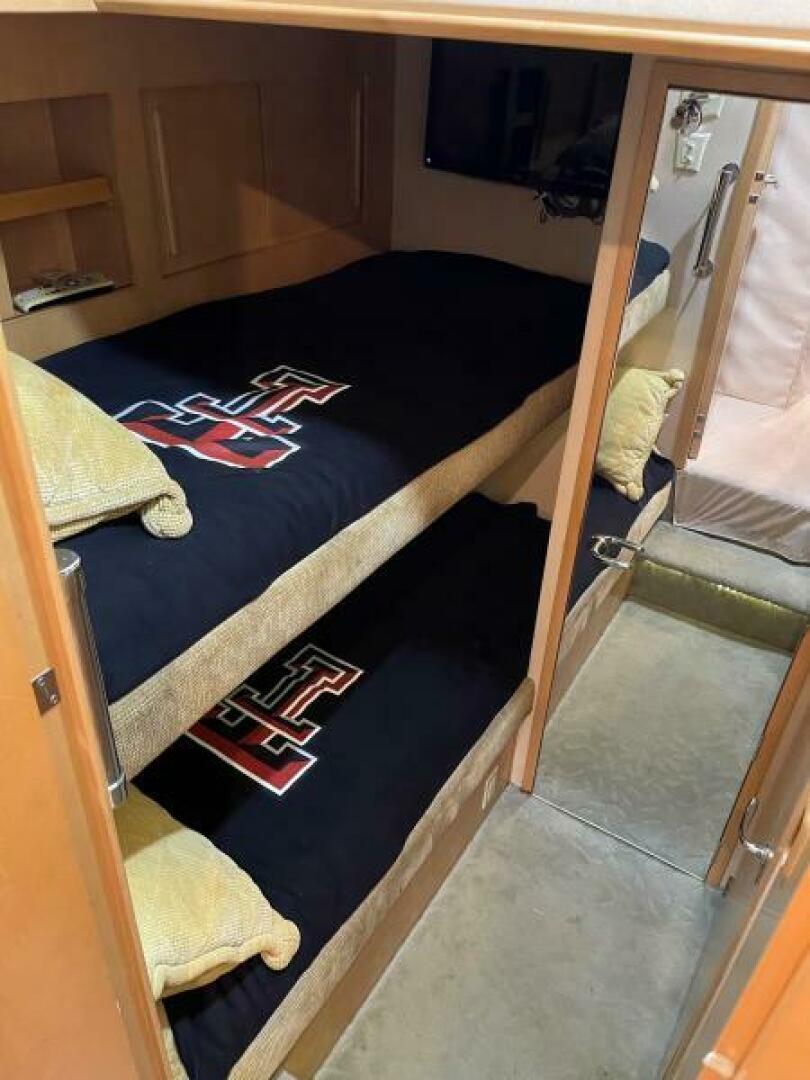 Slide: The Image of 1998 Hatteras 65 Sport Fish Crew Bunkroom - 4928848