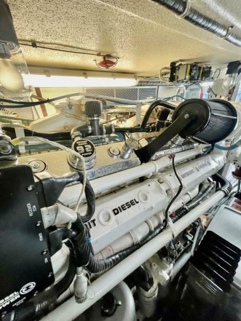 Slide: The Image of 1998 Hatteras 65 Sport Fish Engine Room (2) - 4928856