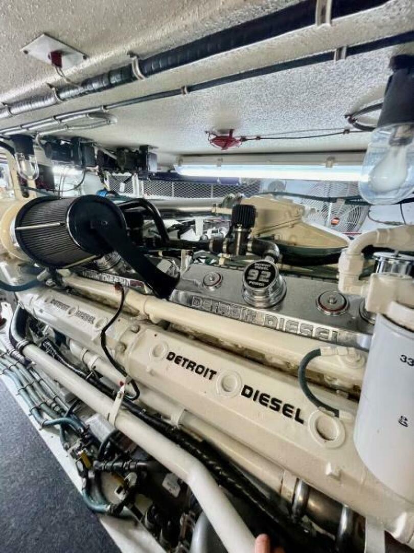Slide: The Image of 1998 Hatteras 65 Sport Fish Engine Room (3) - 4928857