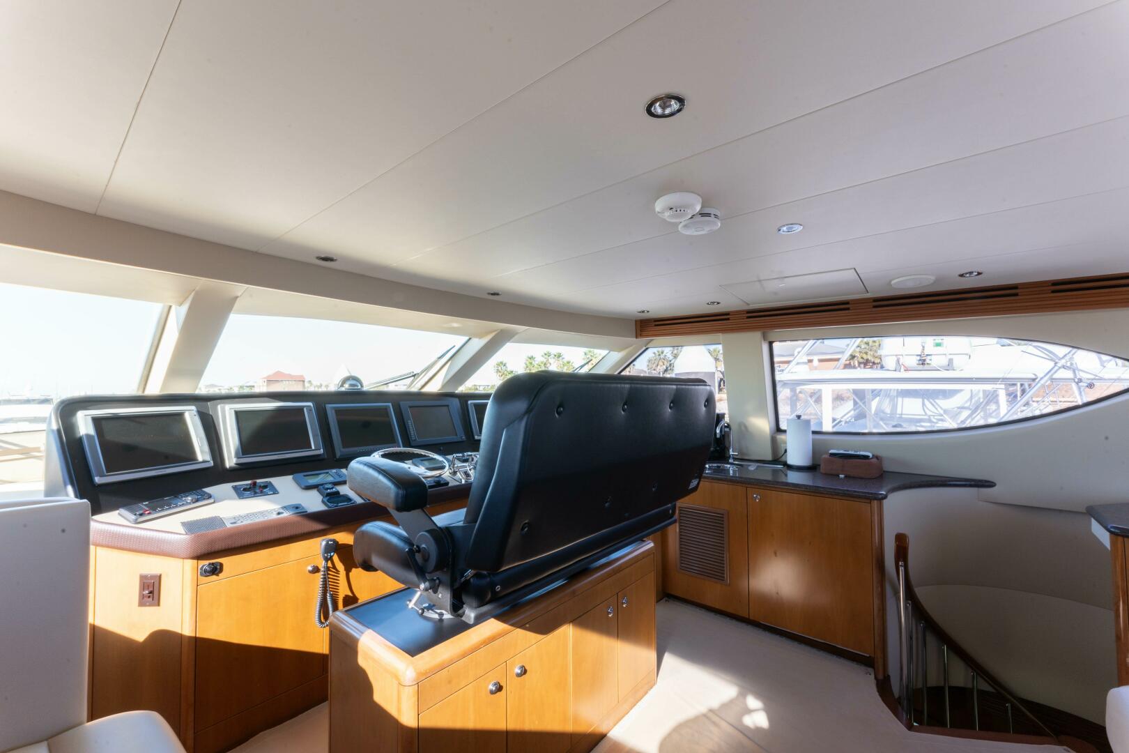 Slide: The Image of 2006 Hatteras 68 Enclosed Bridge Dr. Dark - 24