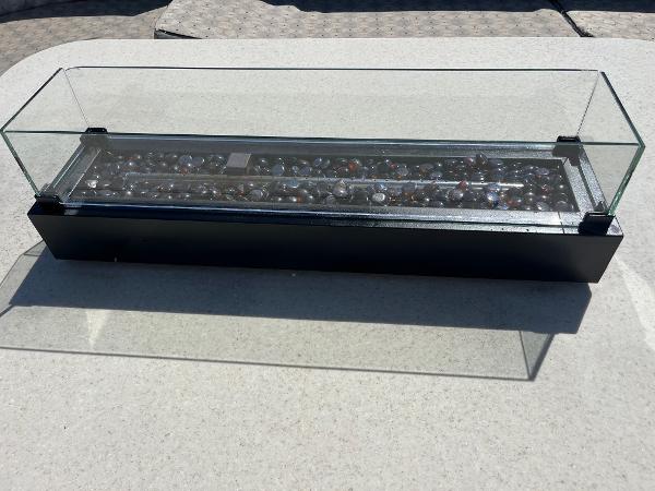 Slide: The Image of Glass-enclosed decorative display on a Hatteras 70' Cockpit Motor Yacht, 1986 model. - 34