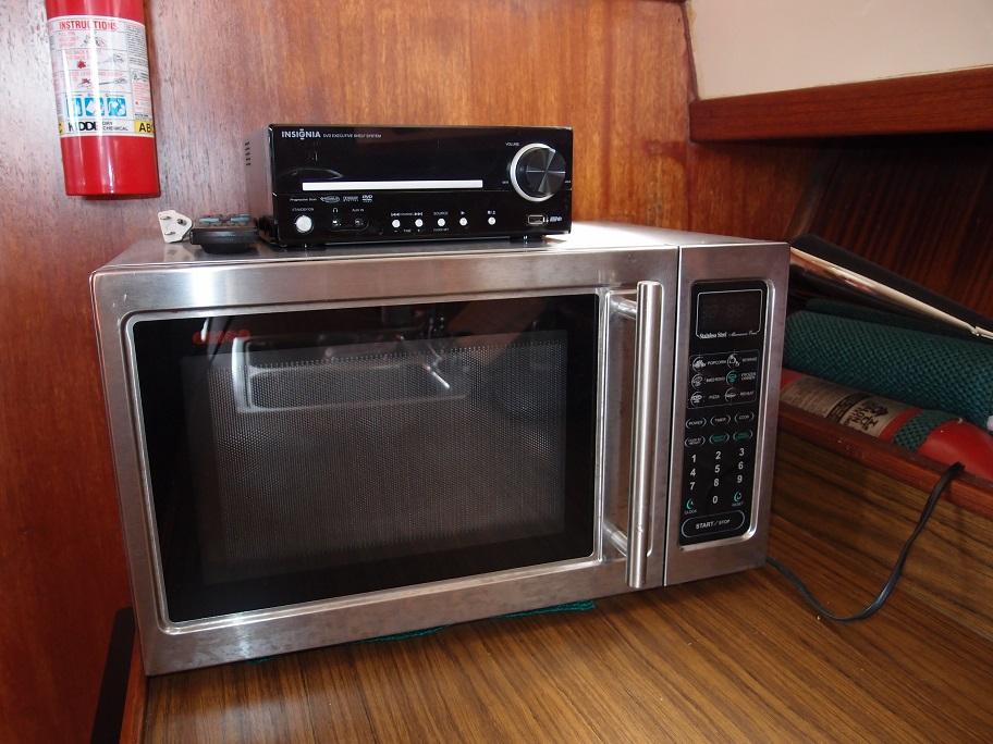 Slide: The Image of Microwave and stereo system inside a 1961 Hatteras Convertible boat. - 18