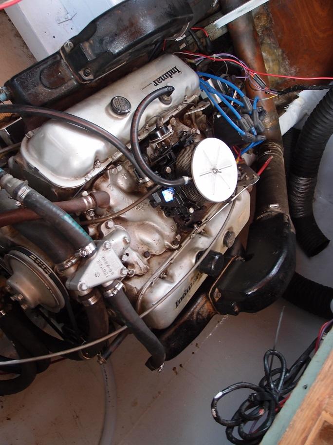 Slide: The Image of 1961 Hatteras Convertible engine compartment with visible wiring and components. - 23