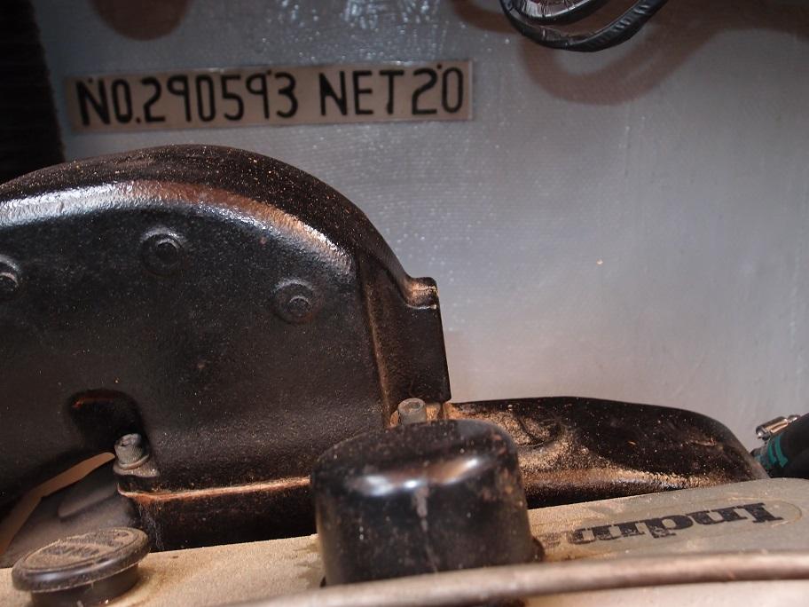 Slide: The Image of Close-up of a 1961 Hatteras Convertible engine part with serial number NO.290593 NET20. - 26