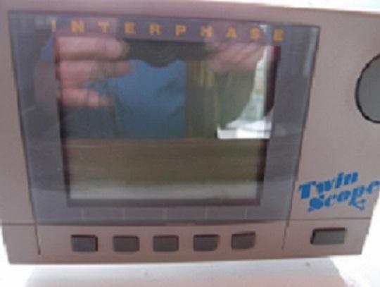 Slide: The Image of Interphase Twin Scope display on a 1961 Hatteras Convertible boat. - 29