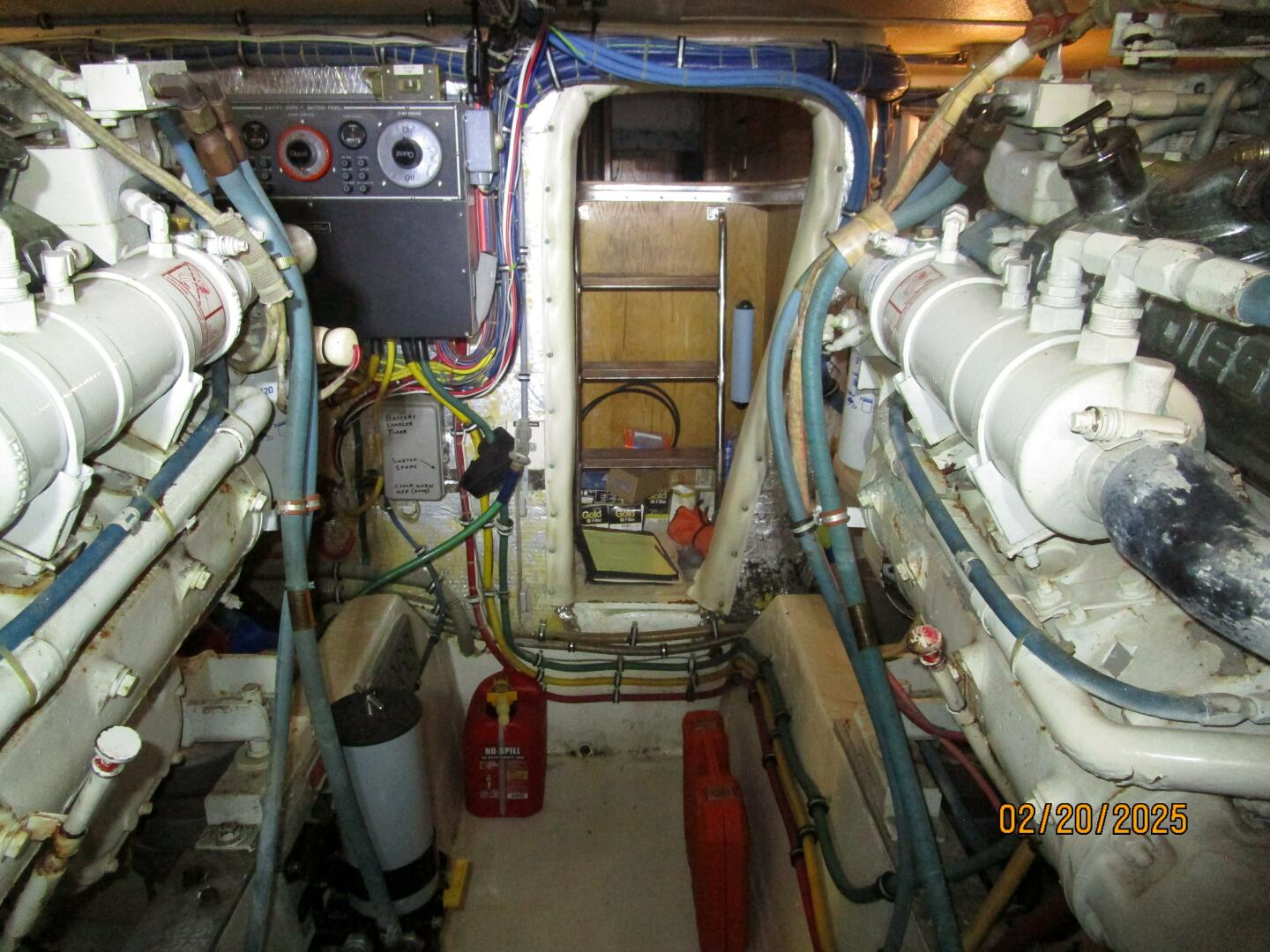 Slide: The Image of 48' Hatteras engine room forward - 5059486