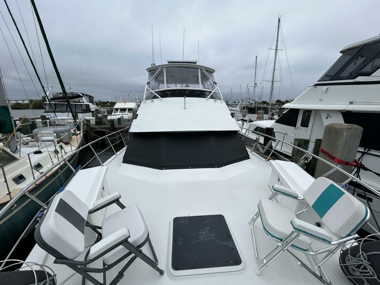 Slide: The Image of 48' Hatteras foredeck aft - 5059754