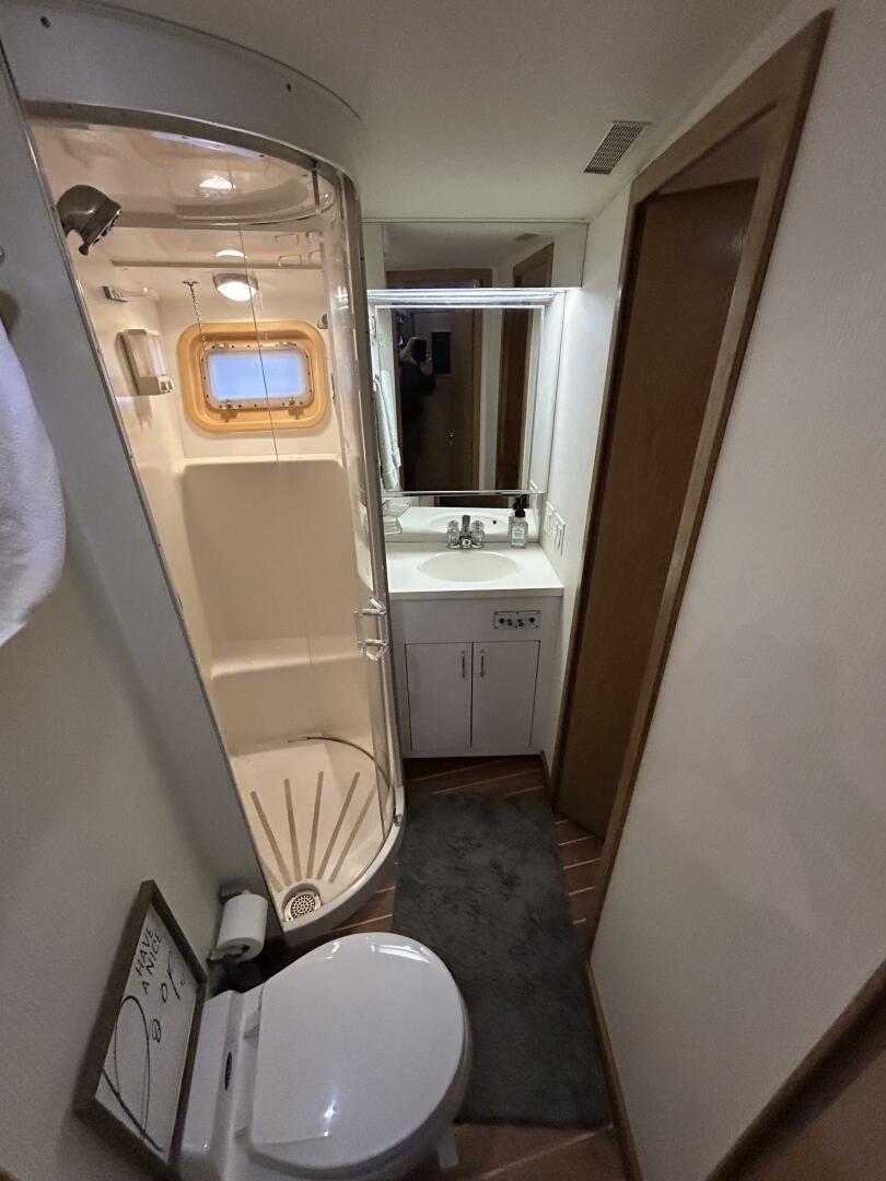 Slide: The Image of 48' Hatteras guest stateroom head-shower - 5059768