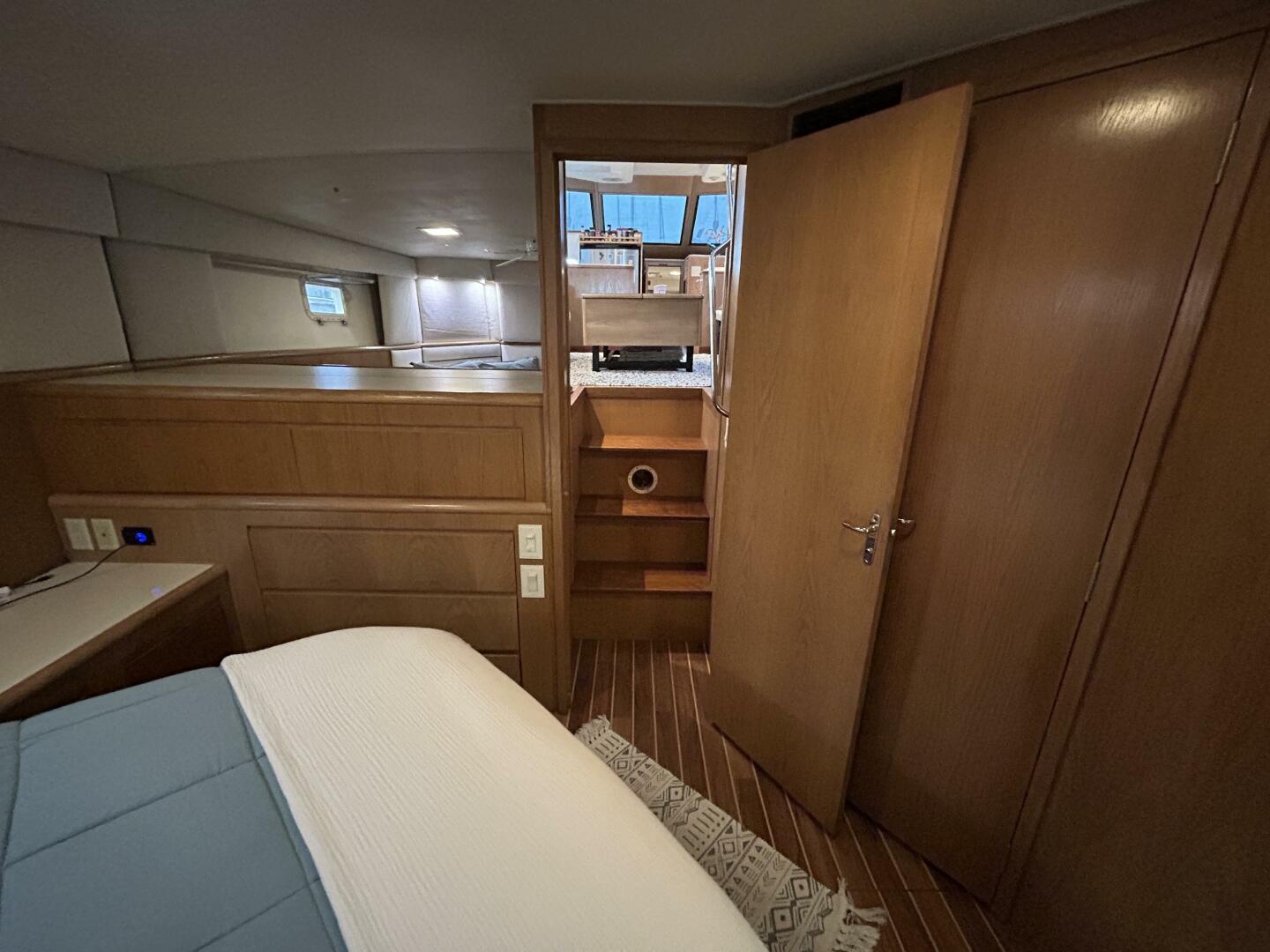 Slide: The Image of 48' Hatteras master stateroom forward - 5059786