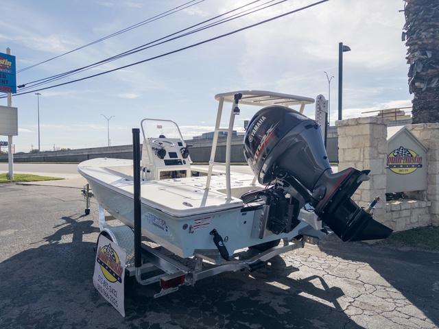 Slide: The Image of 2024 Hewes Redfisher 18 boat with Yamaha outboard motor on trailer. - 10