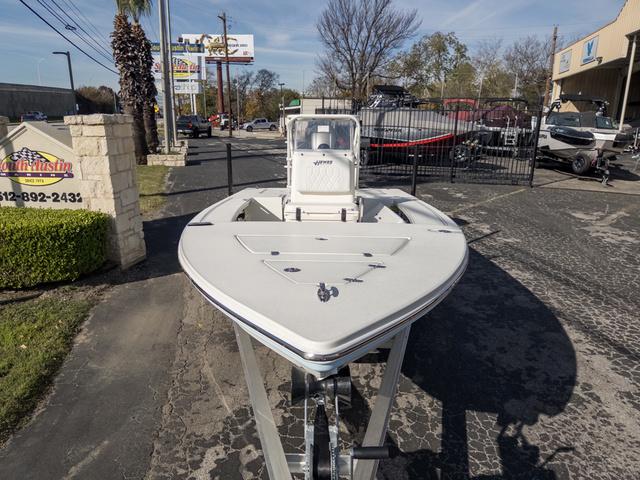 Slide: The Image of 2024 Hewes Redfisher 18 boat on trailer in outdoor dealership lot. - 3