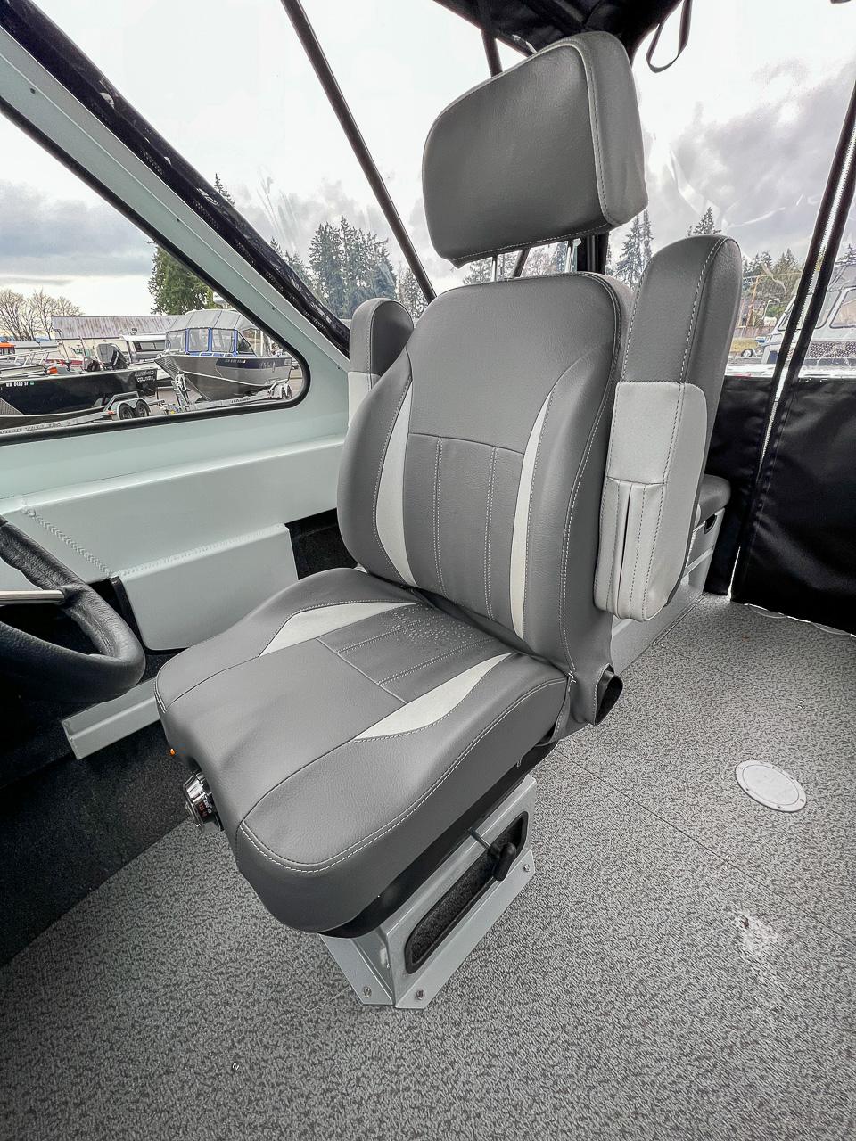 Slide: The Image of 2023 Hewescraft 190 Sea Runner captain's chair in gray and white upholstery. - 10