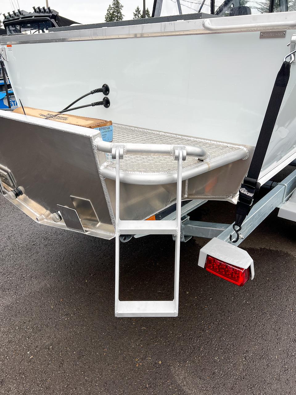 Slide: The Image of 2023 Hewescraft 190 Sea Runner boat with rear ladder and trailer. - 20