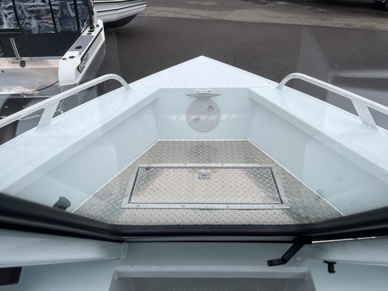 Slide: The Image of 2023 Hewescraft 190 Sea Runner bow with diamond plate flooring. - 7