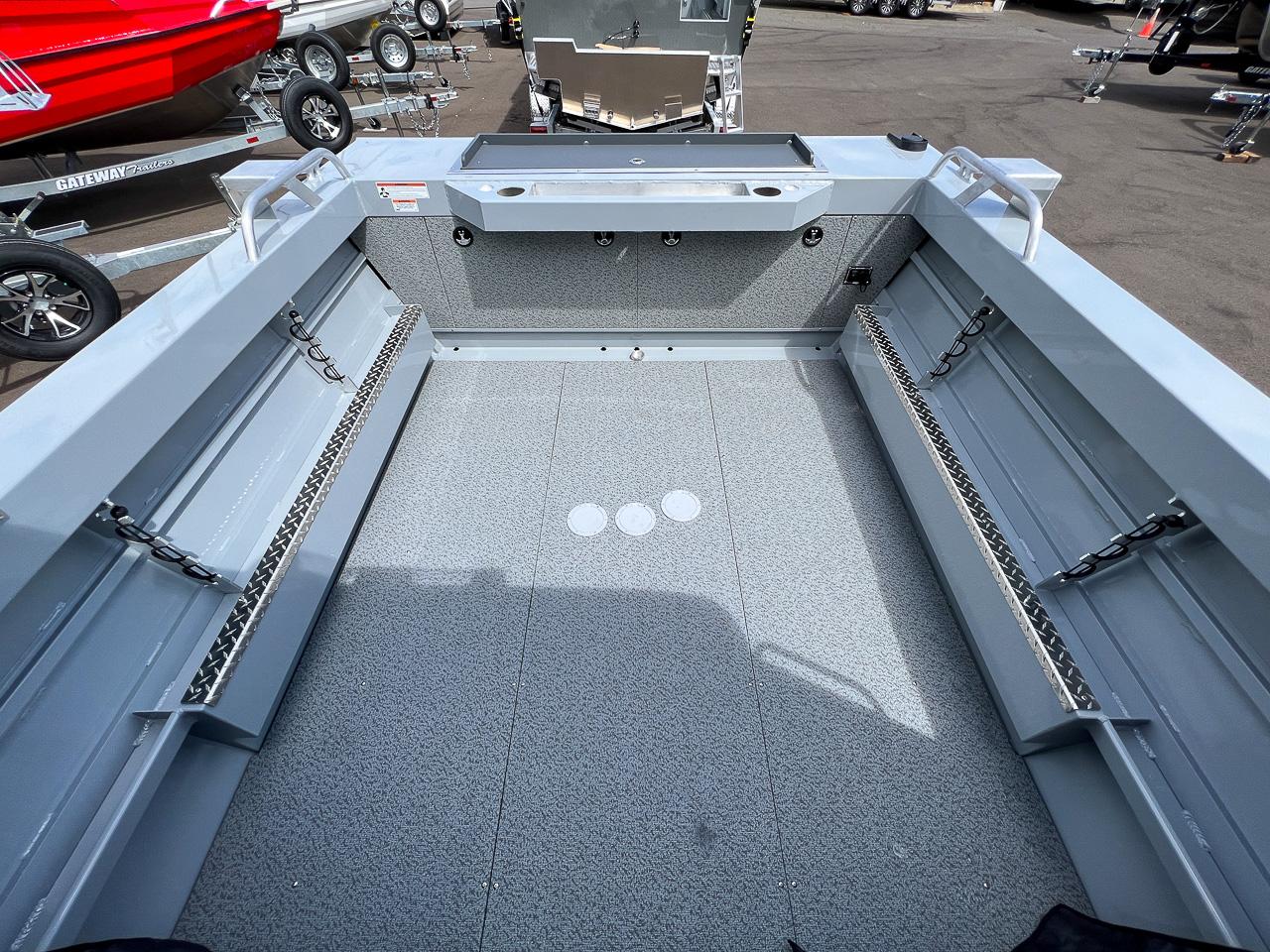 Slide: The Image of 2023 Hewescraft 200 Pro-V ET HT boat interior with spacious deck and storage compartments. - 13