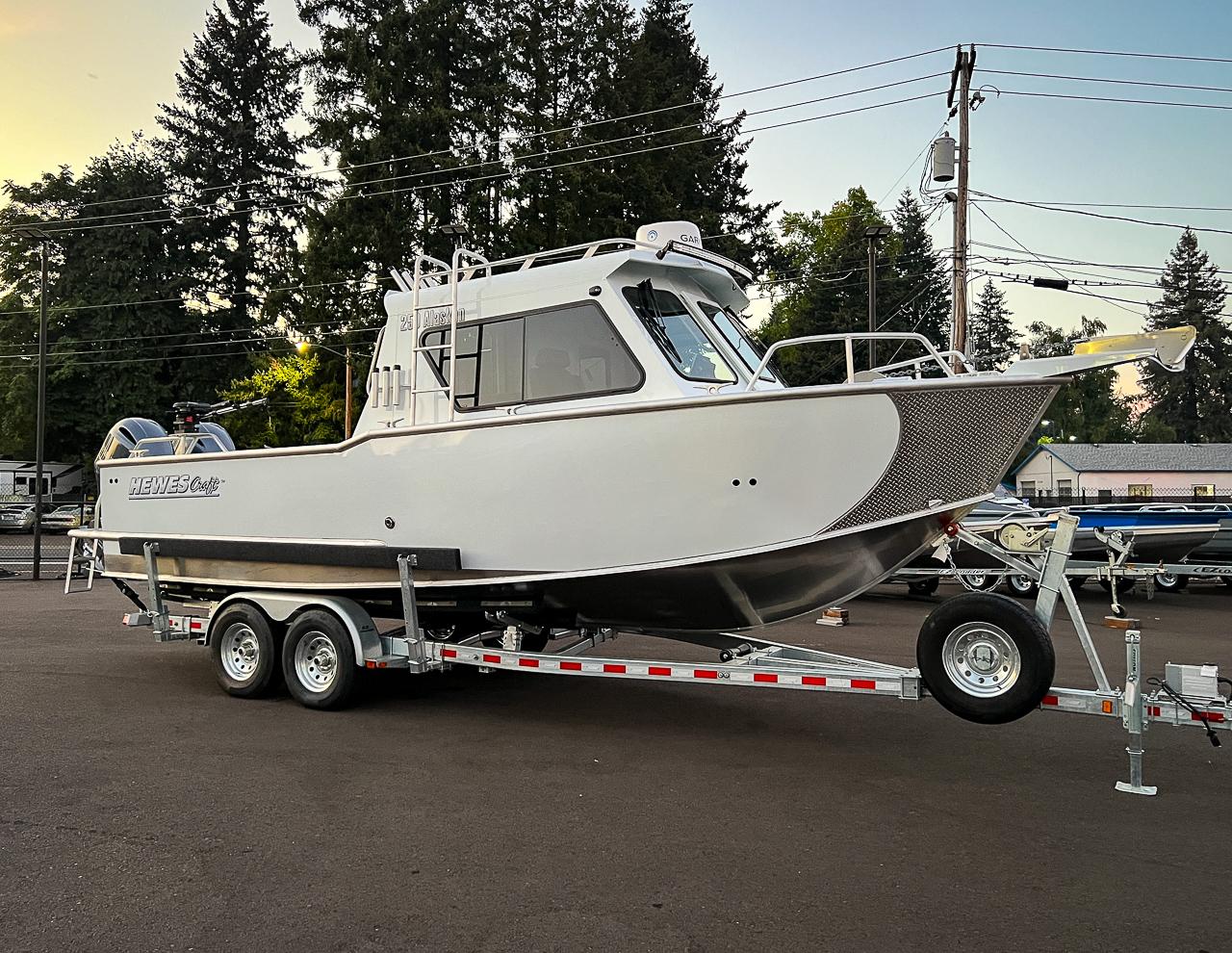 Slide: The Image of Hewescraft 250 Alaskan 2026 - 1