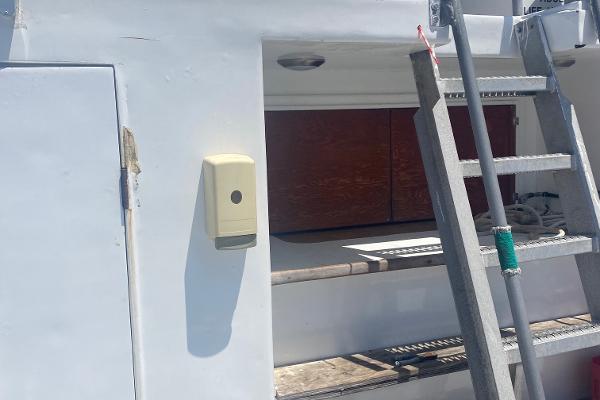 Slide: The Image of 1945 Higgins PT boat with ladder and open hatch. - 6