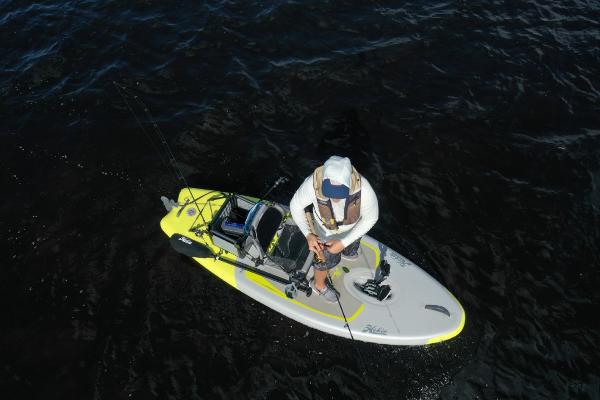 Slide: The Image of Aerial view of a person fishing on a 2023 Hobie iTrek 9 Ultralight kayak. - 8