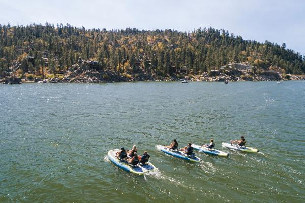 Slide: The Image of People enjoying a lake on 2023 Hobie iTrek Fiesta inflatable kayaks. - 5