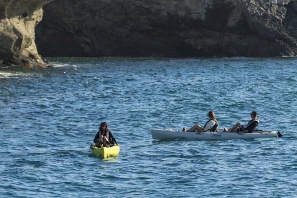 Slide: The Image of People kayaking on the ocean with a 2022 Hobie Mirage Oasis. - 9