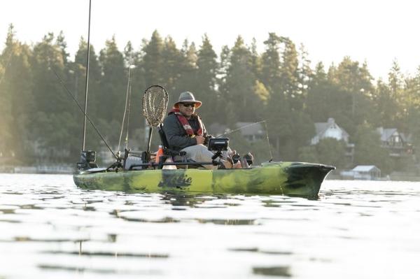 Slide: The Image of Angler fishing on a 2023 Hobie Mirage Pro Angler 12 kayak with 360 Drive Technology. - 4