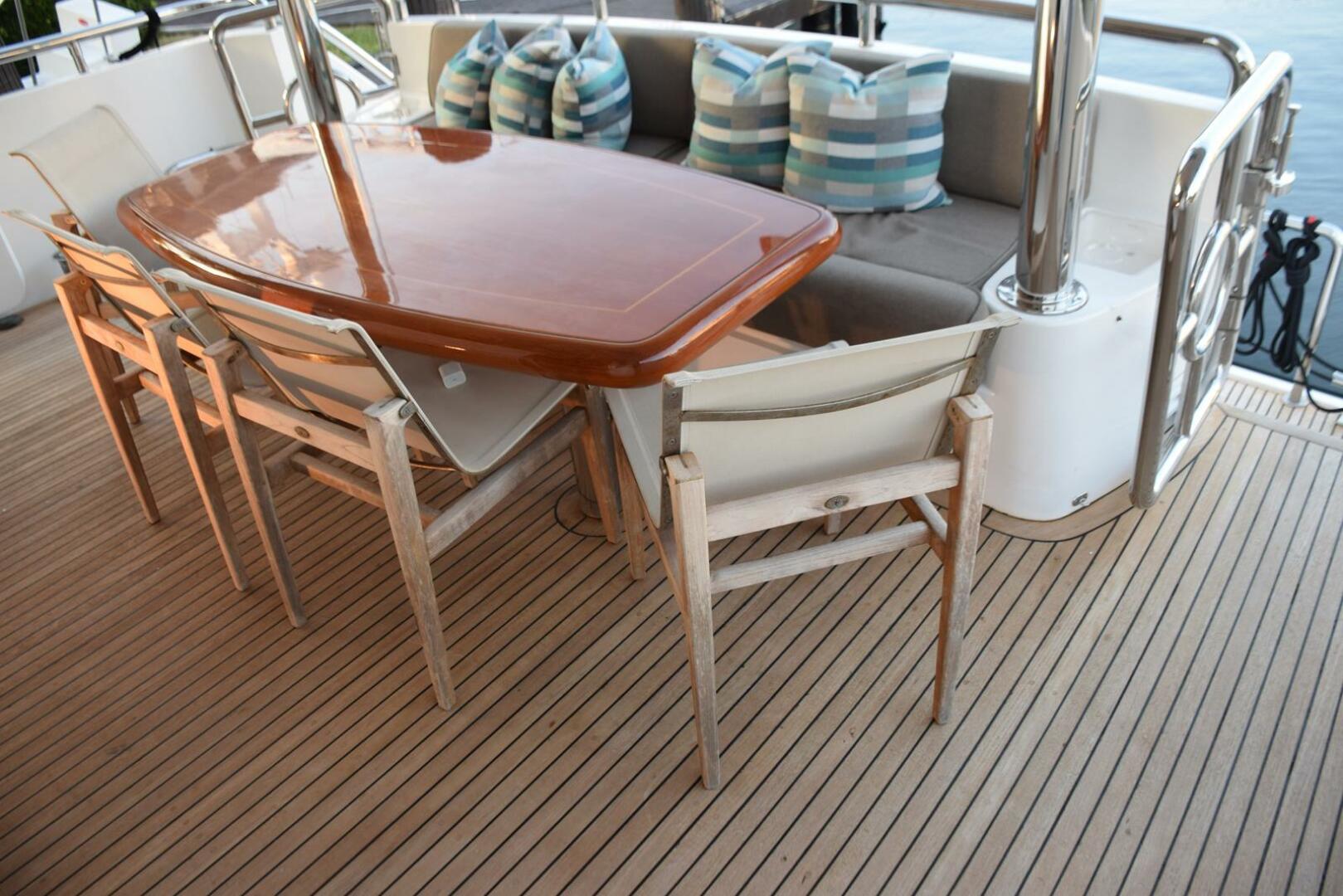 Slide: The Image of Four Teak Sling Chairs At Aft Deck Table - 66