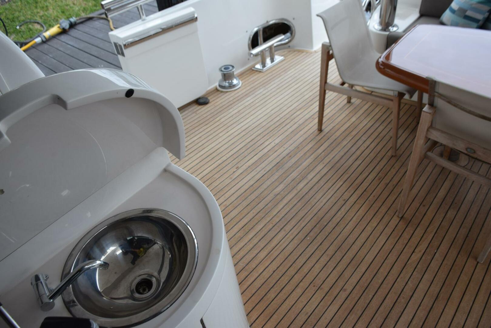 Slide: The Image of Aft Deck Sink and Teak Deck, Capstan   - 69