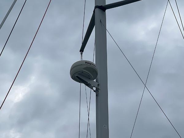 Slide: The Image of Radar equipment on a 2000 Hunter 410 sailboat mast against cloudy sky. - 15