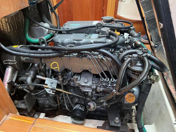 Slide: The Image of Engine of a 2000 Hunter 410 sailboat, showcasing intricate mechanical components. - 46