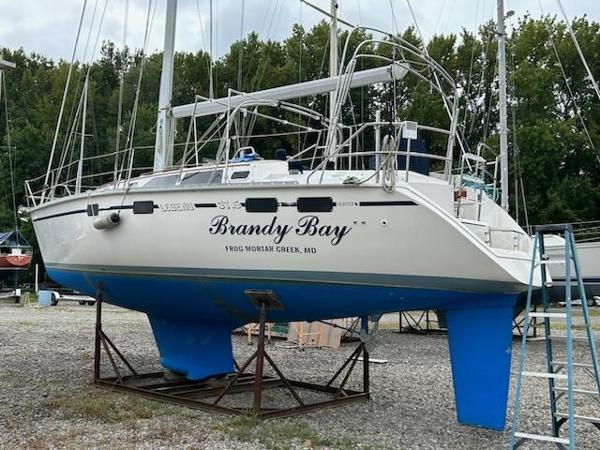 Slide: The Image of 1992 Hunter Legend 37 sailboat Brandy Bay on dry dock for maintenance. - 0