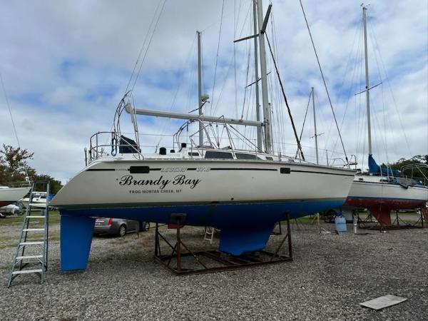Slide: The Image of 1992 Hunter Legend 37 sailboat Brandy Bay on dry dock. - 1