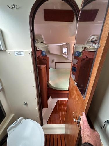 Slide: The Image of Interior of 1992 Hunter Legend 37 sailboat showing cabin and bathroom. - 11