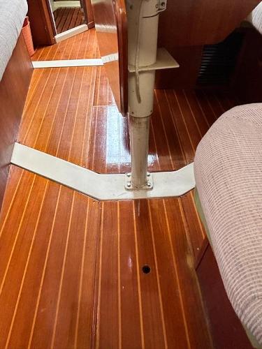 Slide: The Image of Interior of 1992 Hunter Legend 37 sailboat with polished wooden flooring. - 15