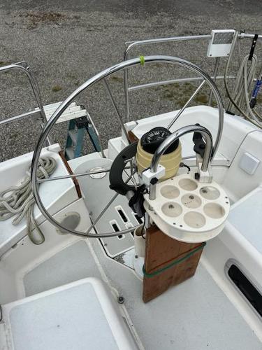 Slide: The Image of Hunter Legend 37 sailboat cockpit with steering wheel, 1992 model. - 2