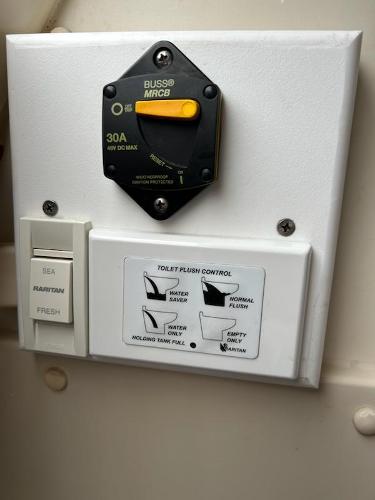 Slide: The Image of Control panel on a 1992 Hunter Legend 37 sailboat. - 29