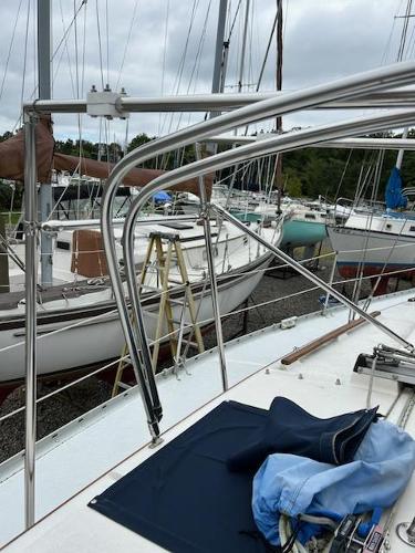 Slide: The Image of 1992 Hunter Legend 37 sailboat on dry dock with other boats. - 33