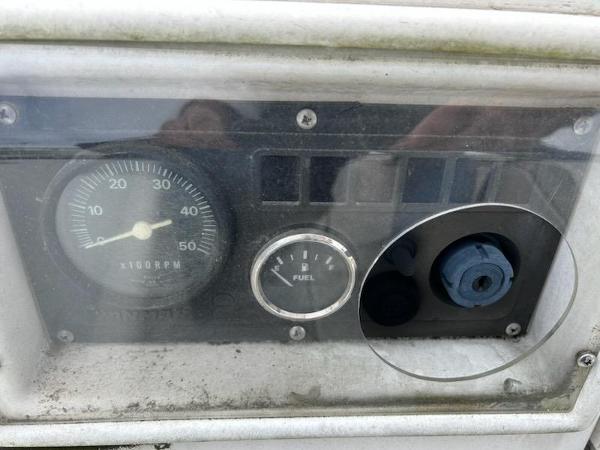 Slide: The Image of Close-up of 1992 Hunter Legend 37 boat dashboard with fuel gauge and RPM meter. - 4