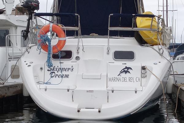Slide: The Image of Hunter Passage 420 sailboat docked at Marina del Rey, California, named "Skipper's Dream." - 10