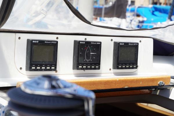 Slide: The Image of Control panel of a 2000 Hunter Passage 420 sailboat with navigation instruments. - 12
