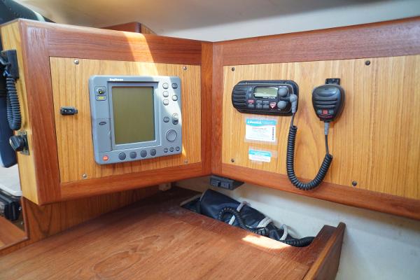 Slide: The Image of Navigation and communication equipment on a 2000 Hunter Passage 420 sailboat. - 19