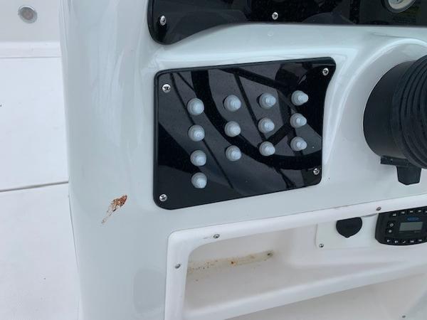 Slide: The Image of Control panel of a 2004 Hurricane 187SD boat. - 17