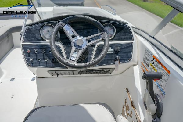 Slide: The Image of 2020 Hurricane 217 SD boat dashboard and steering wheel. - 11