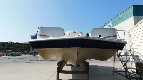 Slide: The Image of 2006 Hurricane 22 Deck Boat on dry dock, front view. - 3