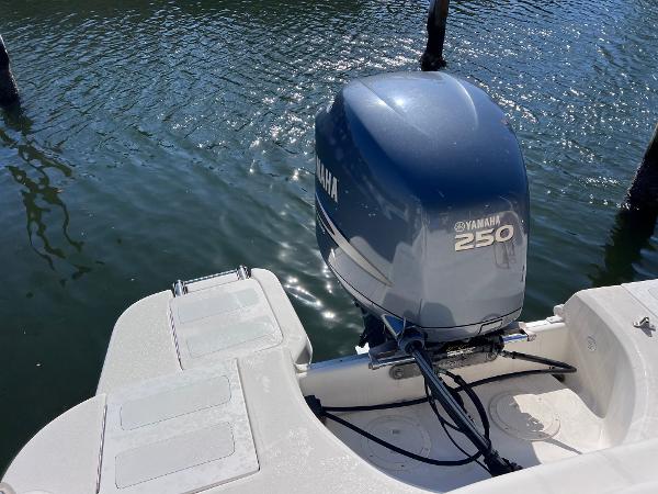 Slide: The Image of 2007 Hurricane 237 Sundeck with Yamaha F250 outboard motor on water. - 12