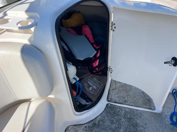 Slide: The Image of Storage compartment on a 2007 Hurricane 237 Sundeck Yamaha F250 boat. - 14