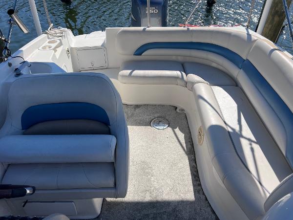 Slide: The Image of 2007 Hurricane 237 Sundeck Yamaha F250 boat interior with cushioned seating. - 8